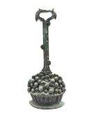 Victorian brass door stop, cast as a basket of fruit and flowers, posted handle, H37cm