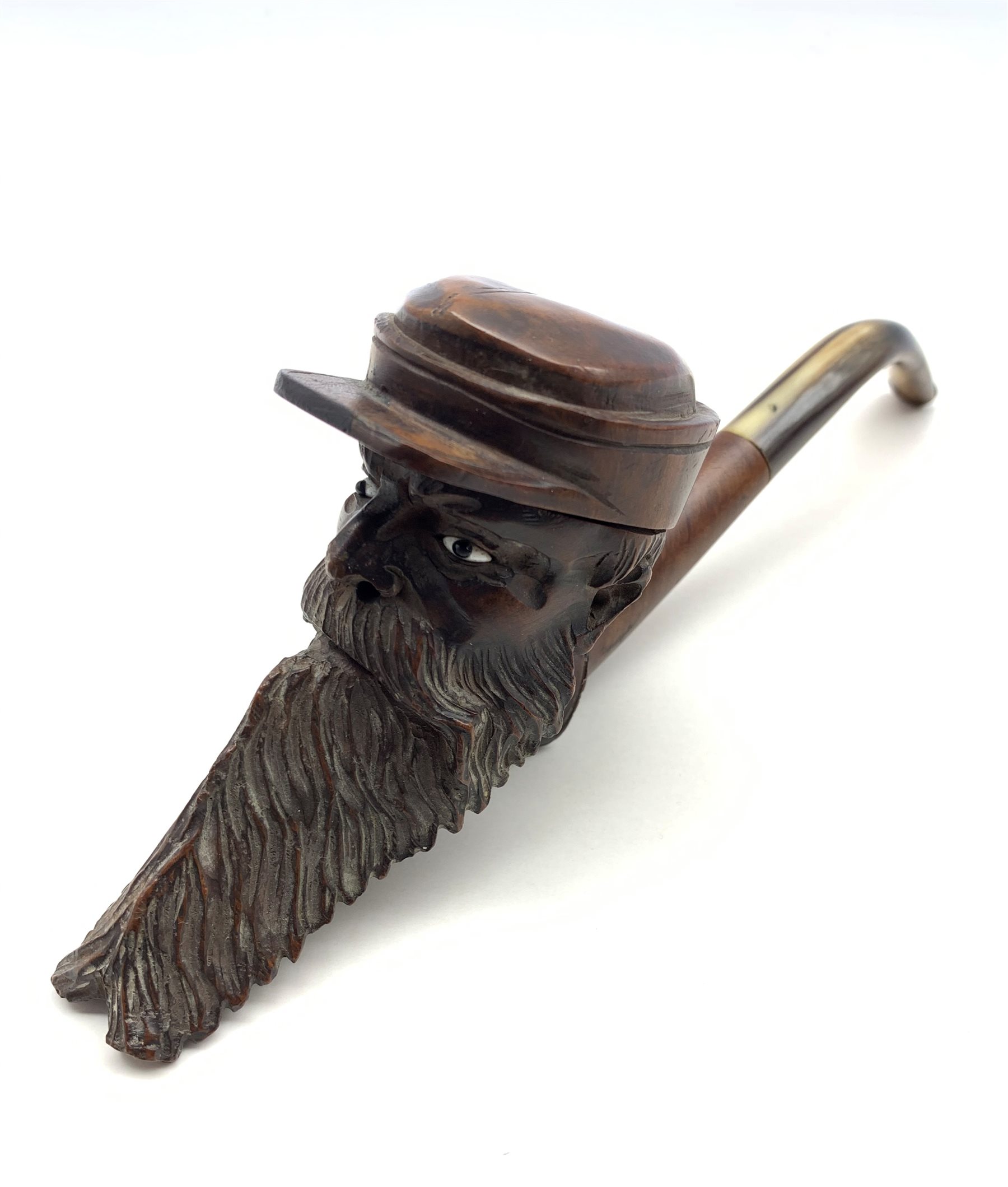 Early 20th century Briar pipe in the form of a bearded gentleman wearing a cap, inset glass eyes and