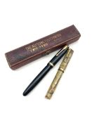 Waterman's Ideal fountain pen in marbled case, together with a Parker Duofold fountain with 14ct nib