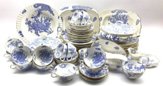 Royal Worcester Blue Dragon pattern dinner service comprising twelve dinner plates, twelve starter p