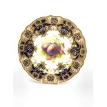 Royal Worcester hand painted cabinet plate by Albert Shuck c1925, centrally decorated with plums and