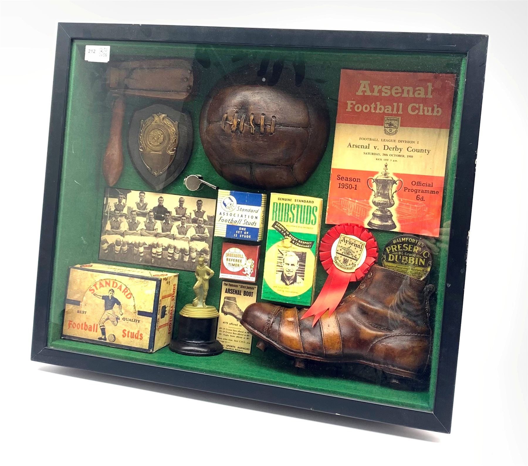 Montage of football items including Arsenal programme 1950, wooden rattle, whistle etc in a glazed c