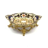 Edwardian Royal Crown Derby Imari pattern dish supported by a 19th century gilt metal stand decorate