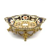 Edwardian Royal Crown Derby Imari pattern dish supported by a 19th century gilt metal stand decorate