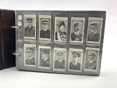 An album of military and sport related cigarette cards, part sets including Turf Cricketers, Gallahe
