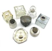 Victorian and later glass inkwells together with a glass and silver-plated match striker vase and si