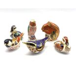 Six Royal Crown Derby paperweights comprising a Red Squirrel, Hummingbird, Coal Tit, two Ducks and