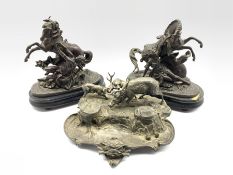 Spelter inkstand fitted with two inkwells and pen tray formed as a Stag hunting scene W29cm and a pa