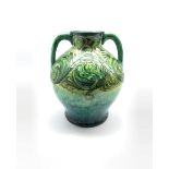 Arts & Crafts Della Robbia (1897-1906) vase of twin-handled baluster form, low-relief, incised and p
