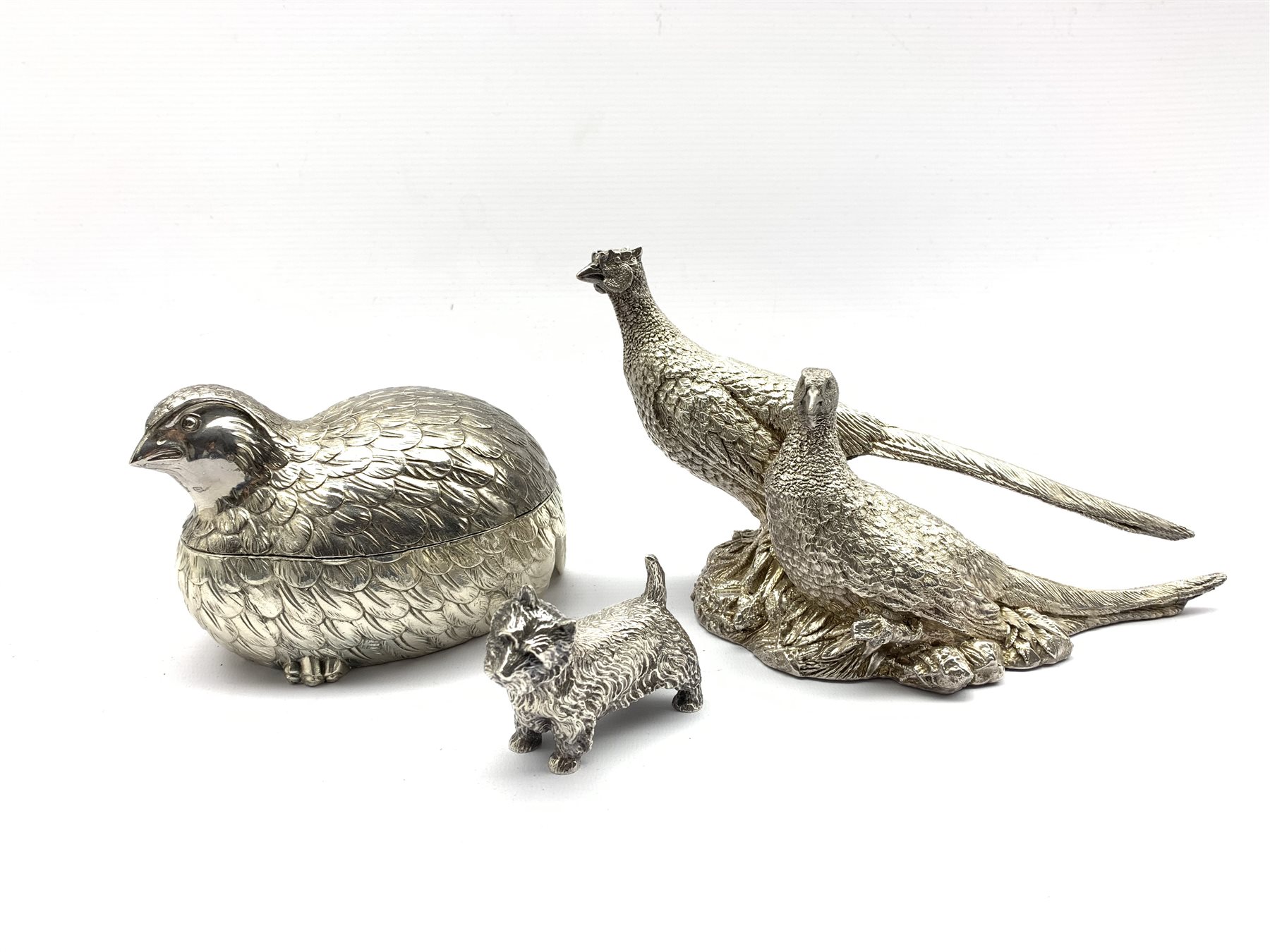A silver-plated model of two Pheasants L24cm, similar style model of a terrier and a silver-plated b
