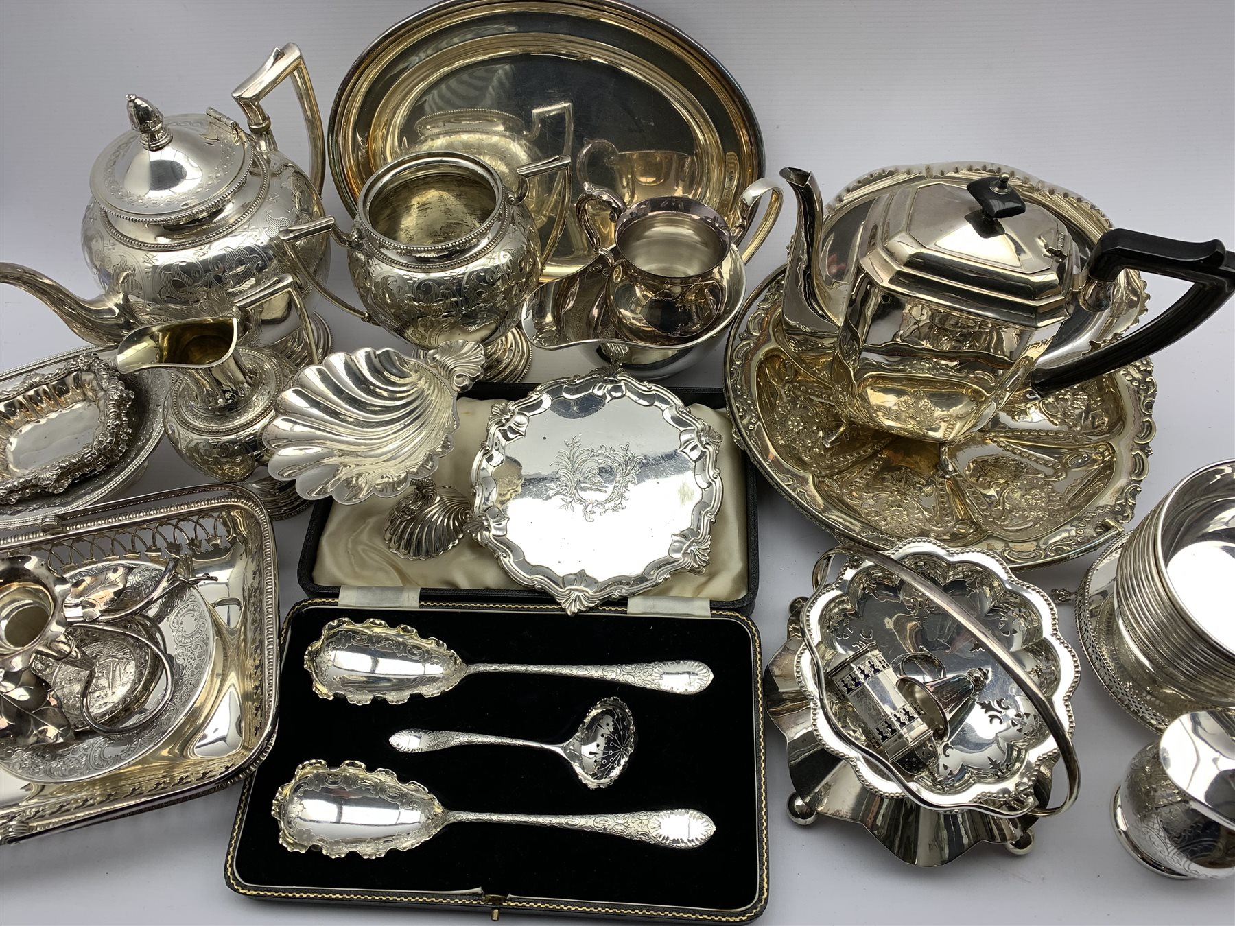 A cased early 20th century Dessert serving set comprising two foliate design spoons and sifter, all - Image 2 of 2