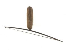 20th century Australian Aboriginal parrying shield of elongated oval form carved with geometric flut