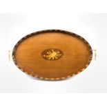 Edwardian mahogany oval tray inlaid with a panel of musical instruments and flowers with brass handl