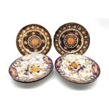 Set of four early 19th century Crown Derby plates decorated in the Kings Imari pattern, D22cm togeth