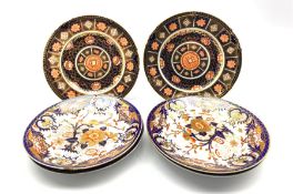 Set of four early 19th century Crown Derby plates decorated in the Kings Imari pattern, D22cm togeth