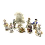 Collection of German and Continental porcelain figures including a pair of Sitzendorf figures, four