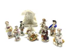 Collection of German and Continental porcelain figures including a pair of Sitzendorf figures, four