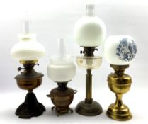Victorian table oil lamp with glass reservoir and brass column H41cm, another with copper reservoir