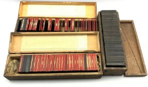 Three boxes of magic lantern slides in various subjects, two of the boxes marked 'Bavarian Tour and