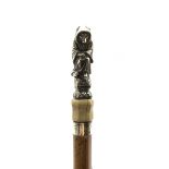 19th century Malacca walking cane, the white metal finial modelled as a Anthropomorphic Fox dressed