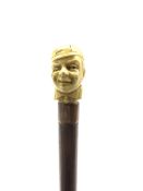 Victorian rosewood walking cane with later ivorine finial in the form of a gentleman's head wearing