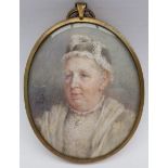 Janet S Robertson (British 1880-1966): Portrait of a Victorian Lady, watercolour miniature on ivory