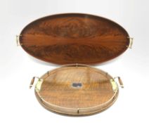 20th century figured mahogany oval tray with brass handles L82cm and an oak oval tray with plated m