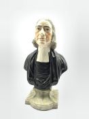 Early 20th century bust of the Reverend John Wesley, modelled half length, wearing clerical robes, u