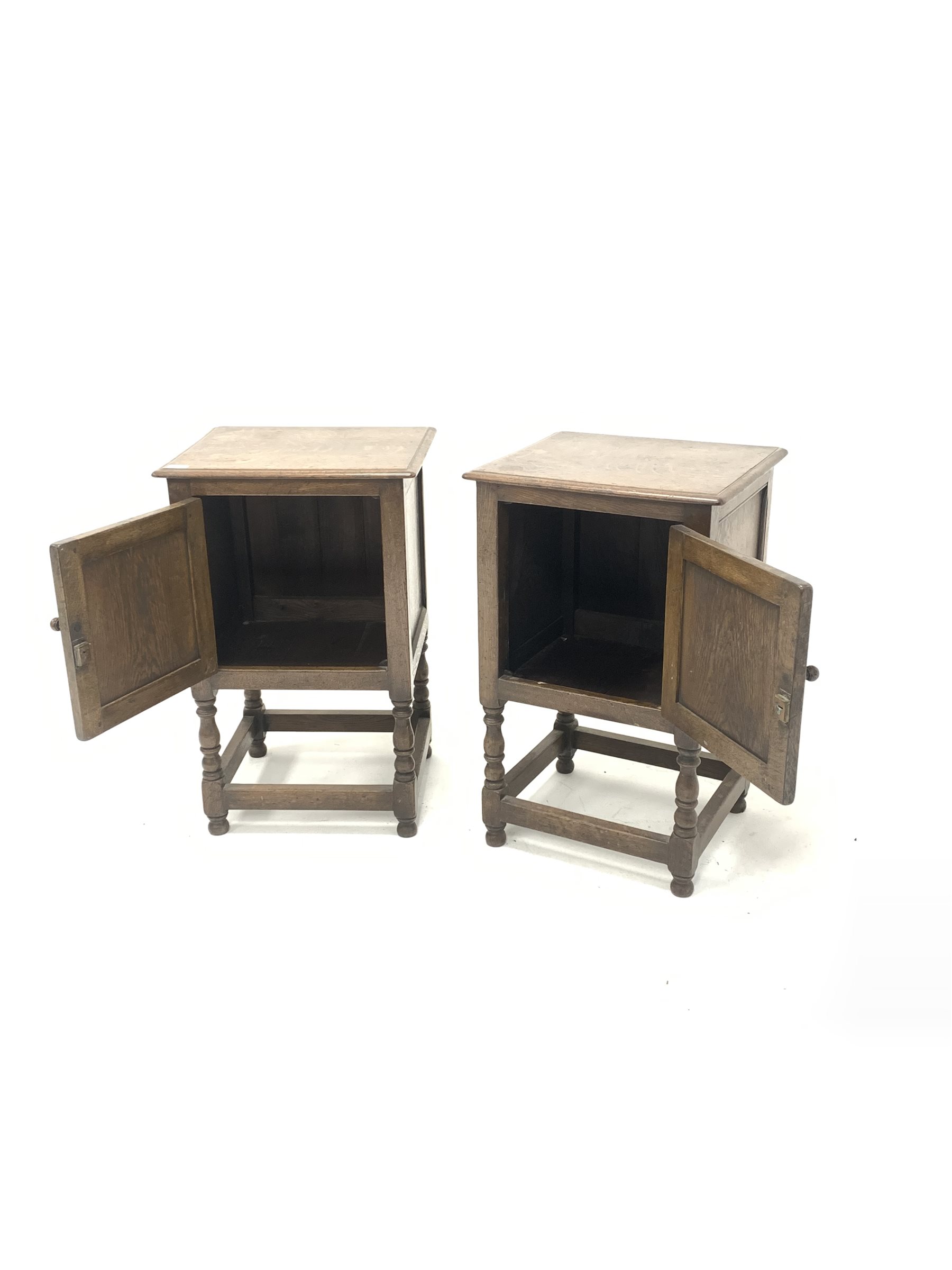 Pair of early 20th century oak bedside cupboards, with fielded panelled doors carved with linen fold - Image 2 of 2