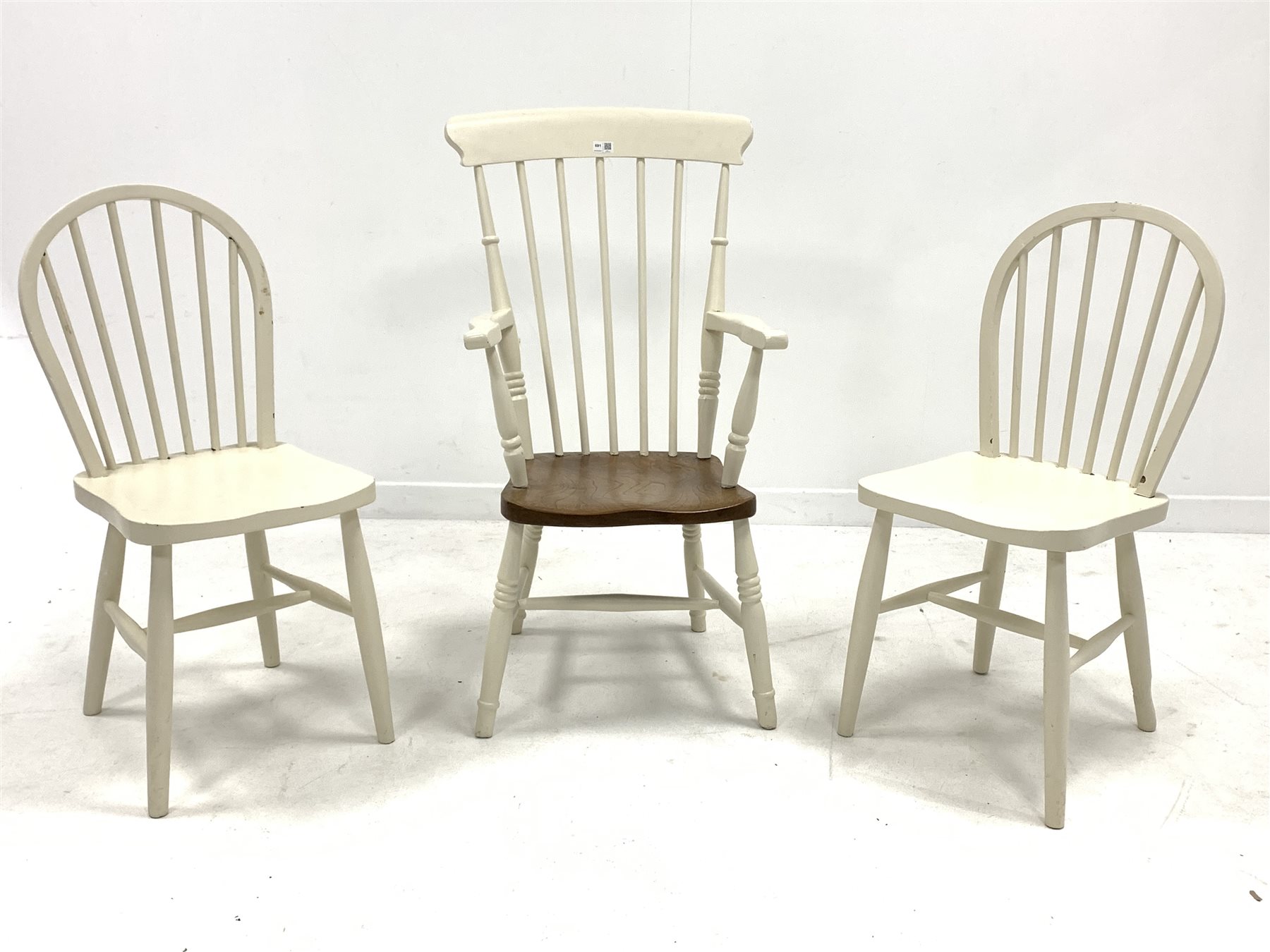 White painted farmhouse carver, with an ash saddle seat over ring turned supports, (W52cm) together
