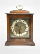 Smiths walnut cased walnut mantel / presentation clock, silvered dial with gilt metal spandrels, pla