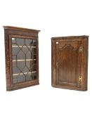 George III oak and mahogany corner cupboard, with astragal glazed door enclosing three shelves, (W78