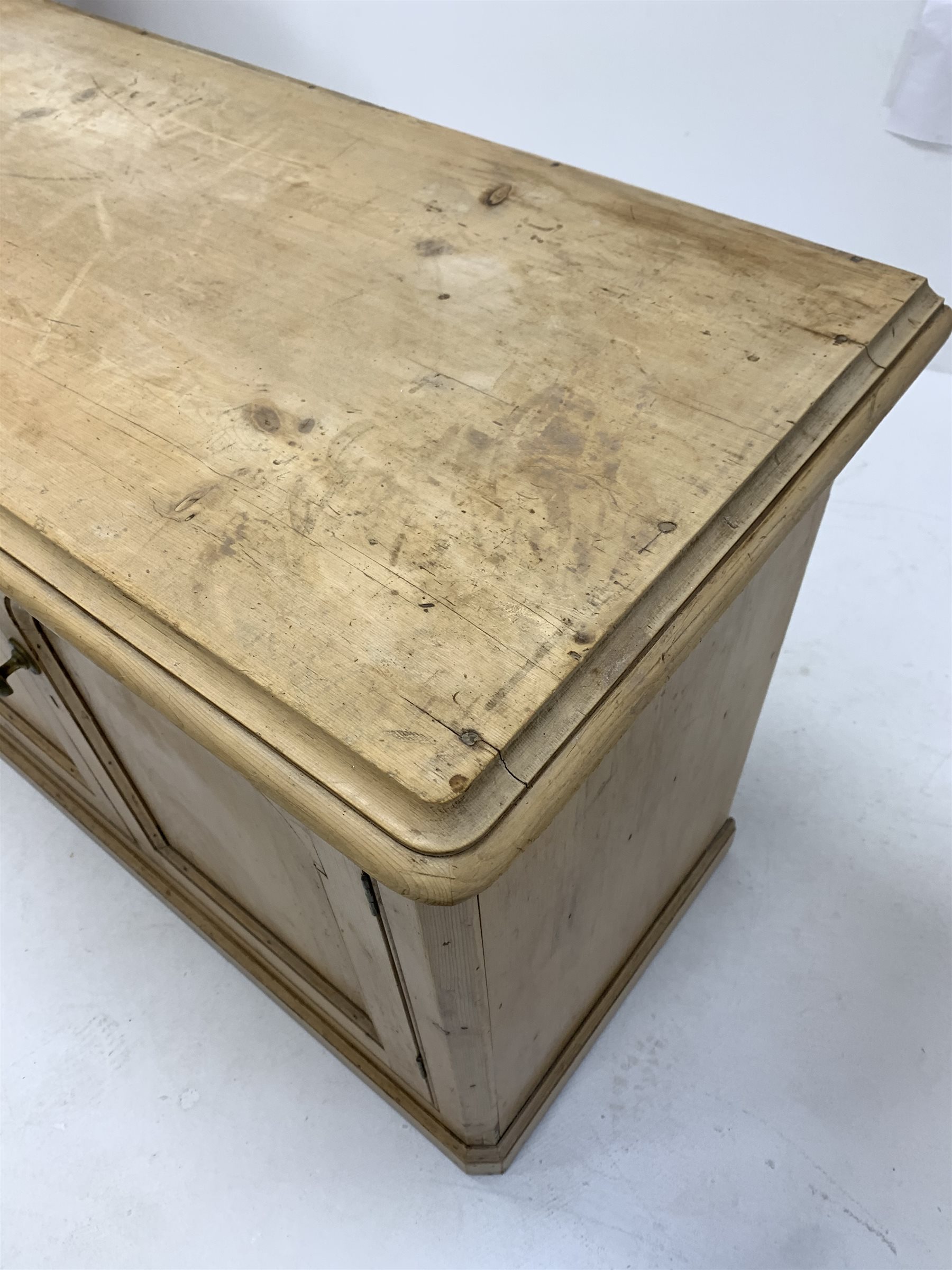 Victorian pine side cabinet, moulded top over double fielded panelled doors enclosing shelves, skirt - Image 3 of 4