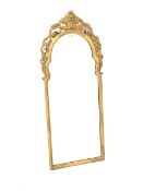 20th century gilt wall hanging mirror, the moulded arched frame surmounted by an urn issuing scrolle