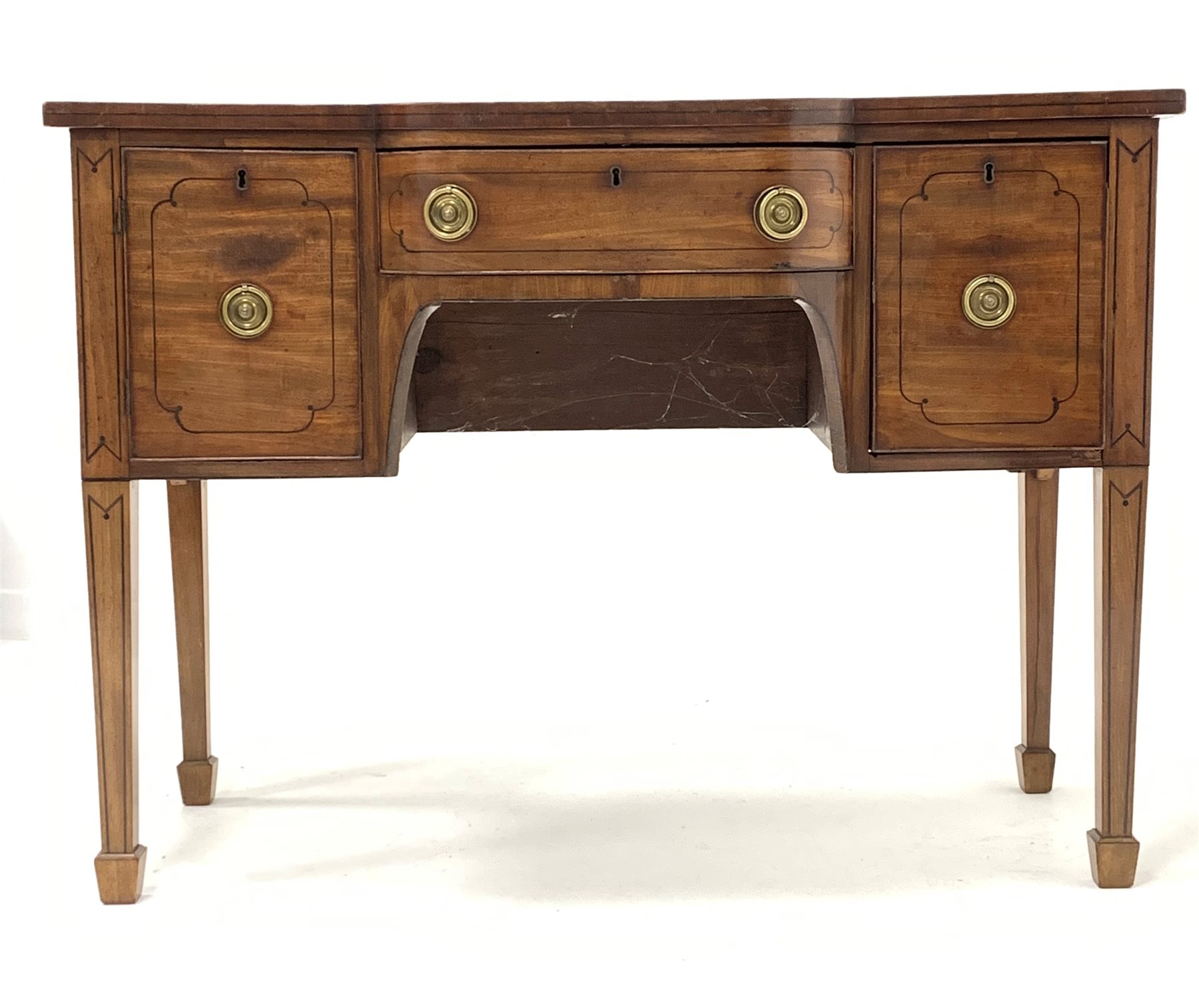 George IV mahogany break bow front sideboard, with ebonised string inlay, two drawers and a cupboard