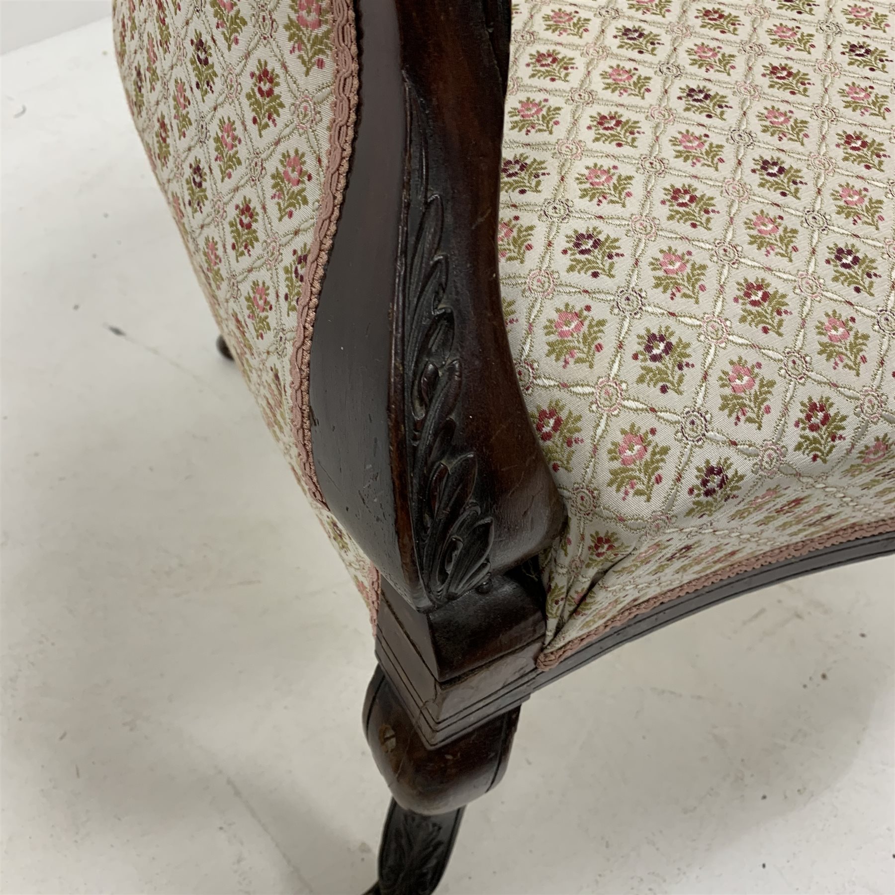 Pair of late Victorian walnut upholstered armchairs, with scrolled arm terminals, raised on floral c - Image 4 of 4