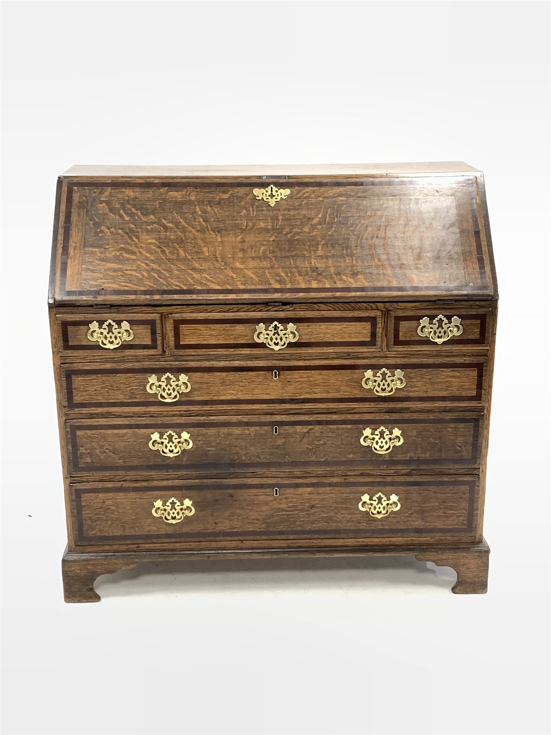 Early 19th century oak and mahogany banded bureau, fall front enclosing interior fitted with small d - Image 2 of 4