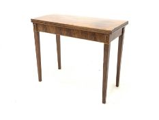 George III mahogany fold over tea table, with boxwood string inlay, raised on square tapered support
