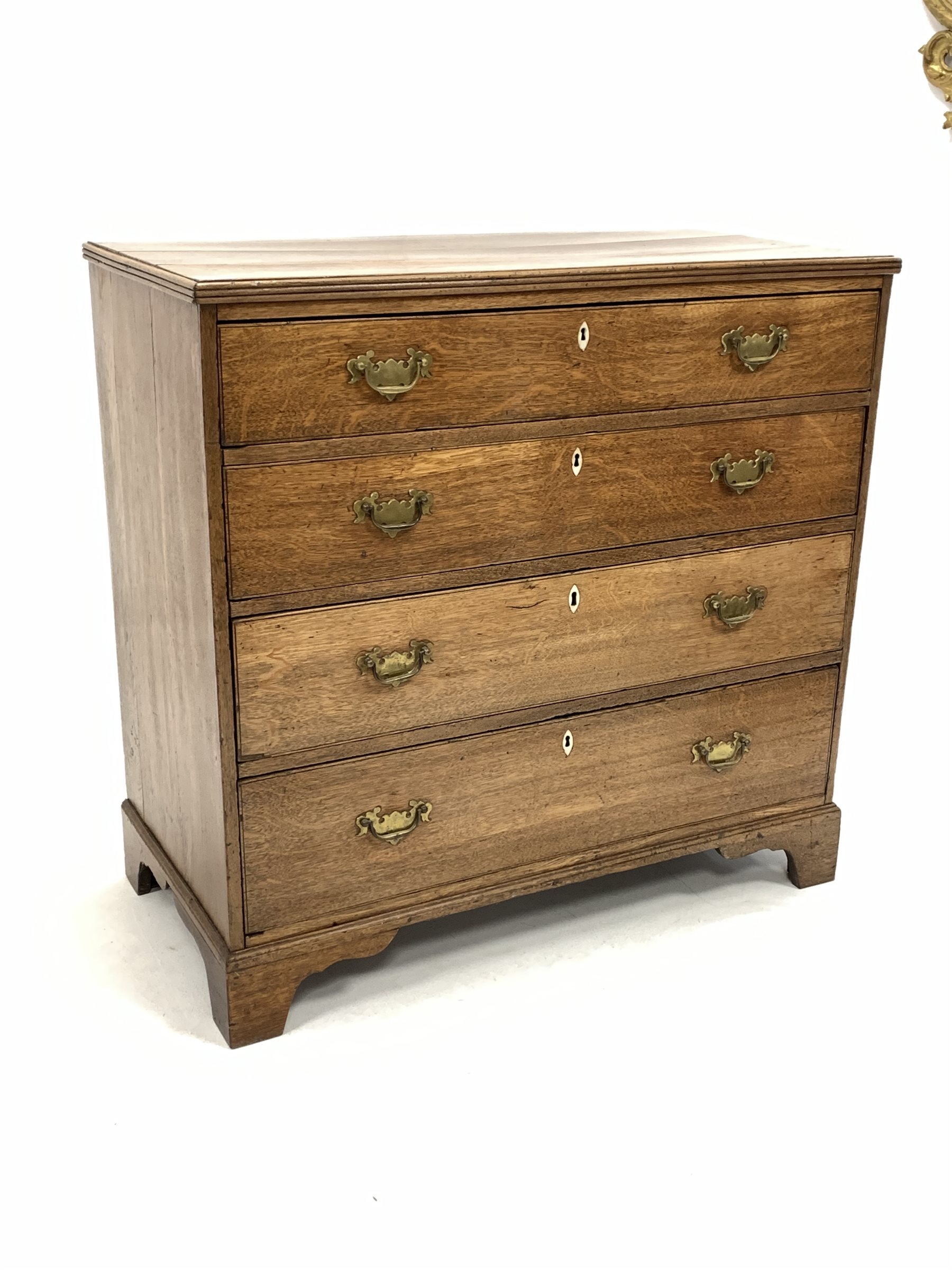 Georgian oak chest fitted with four long graduated drawers, raised on bracket supports - Image 2 of 3