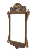 Georgian design walnut fret cut wall mirror surmounted by a gilt hoho bird