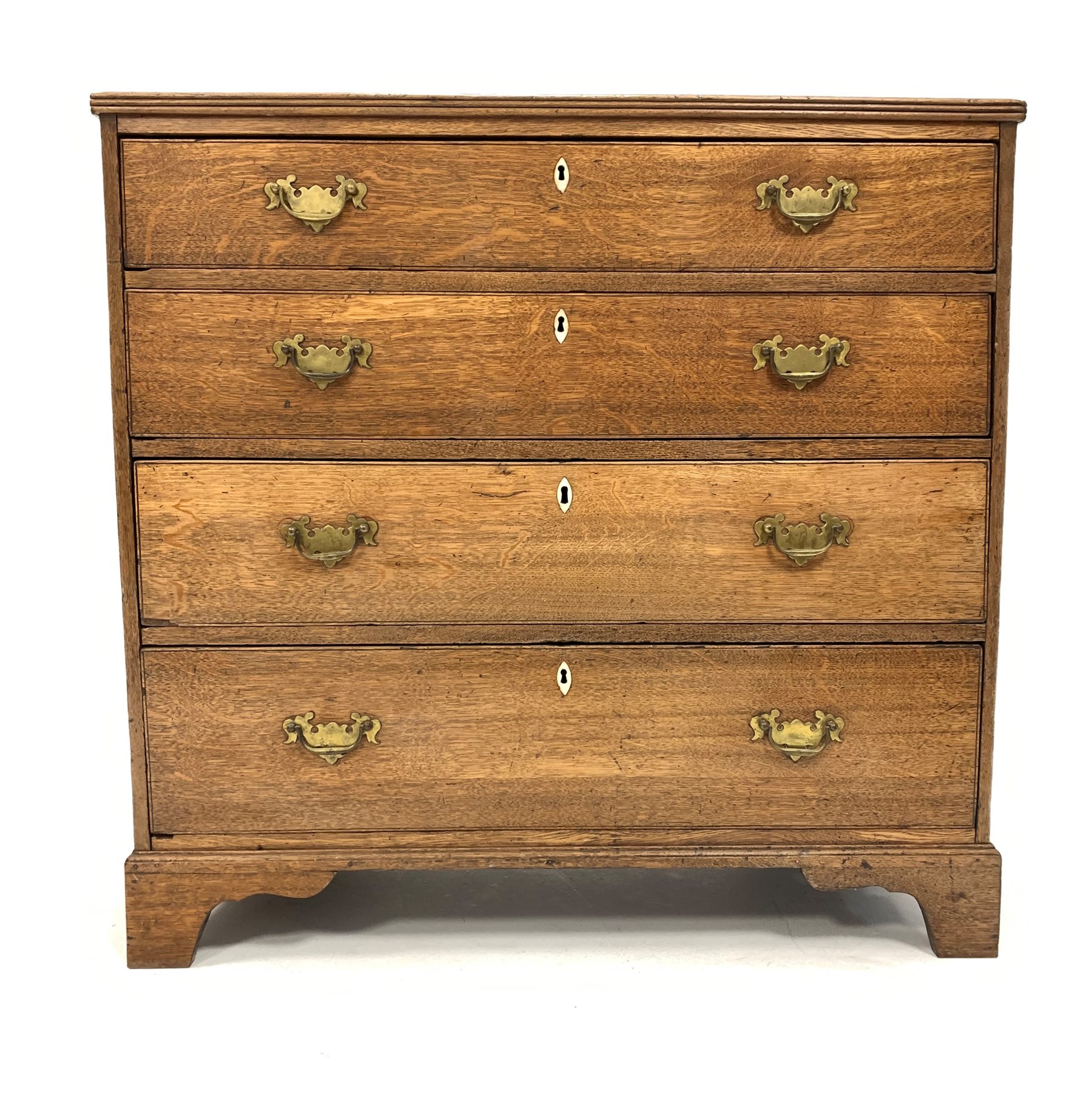 Georgian oak chest fitted with four long graduated drawers, raised on bracket supports