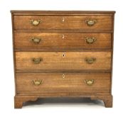 Georgian oak chest fitted with four long graduated drawers, raised on bracket supports