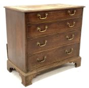 George III oak chest fitted with four long graduated drawers with brass drop handles, raised on brac