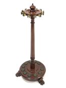 Victorian mahogany cue stand or rack, fitted to hold twelve cues, raised on three carved paw support