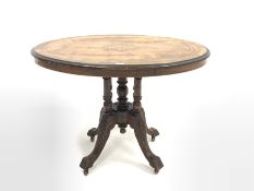 Victorian walnut oval centre table, floral inlaid marquetry to centre encircled by boxwood stringing