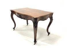 Early 19th century figured mahogany centre table, serpentine top, frieze drawer with shaped apron an