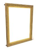 Large early 20th century bevelled edge wall mirror in moulded swept gilt frame, 114cm x 145cm