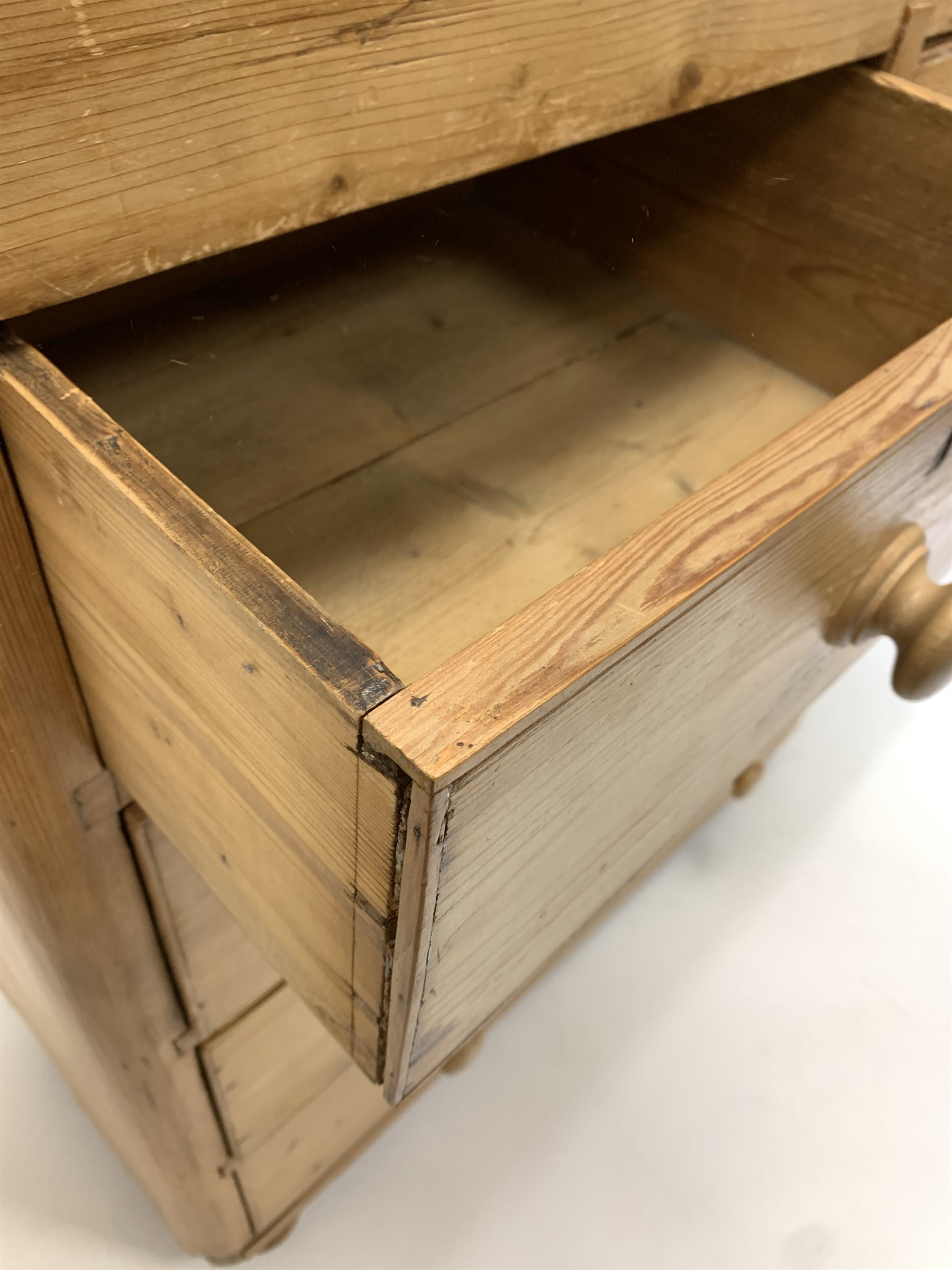 Early 20th century pine chest, fitted with two short and three long drawers, raised on bun supports - Image 3 of 3