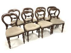 Set eight Victorian style balloon back dining chairs with floral carved rail over upholstered seat,