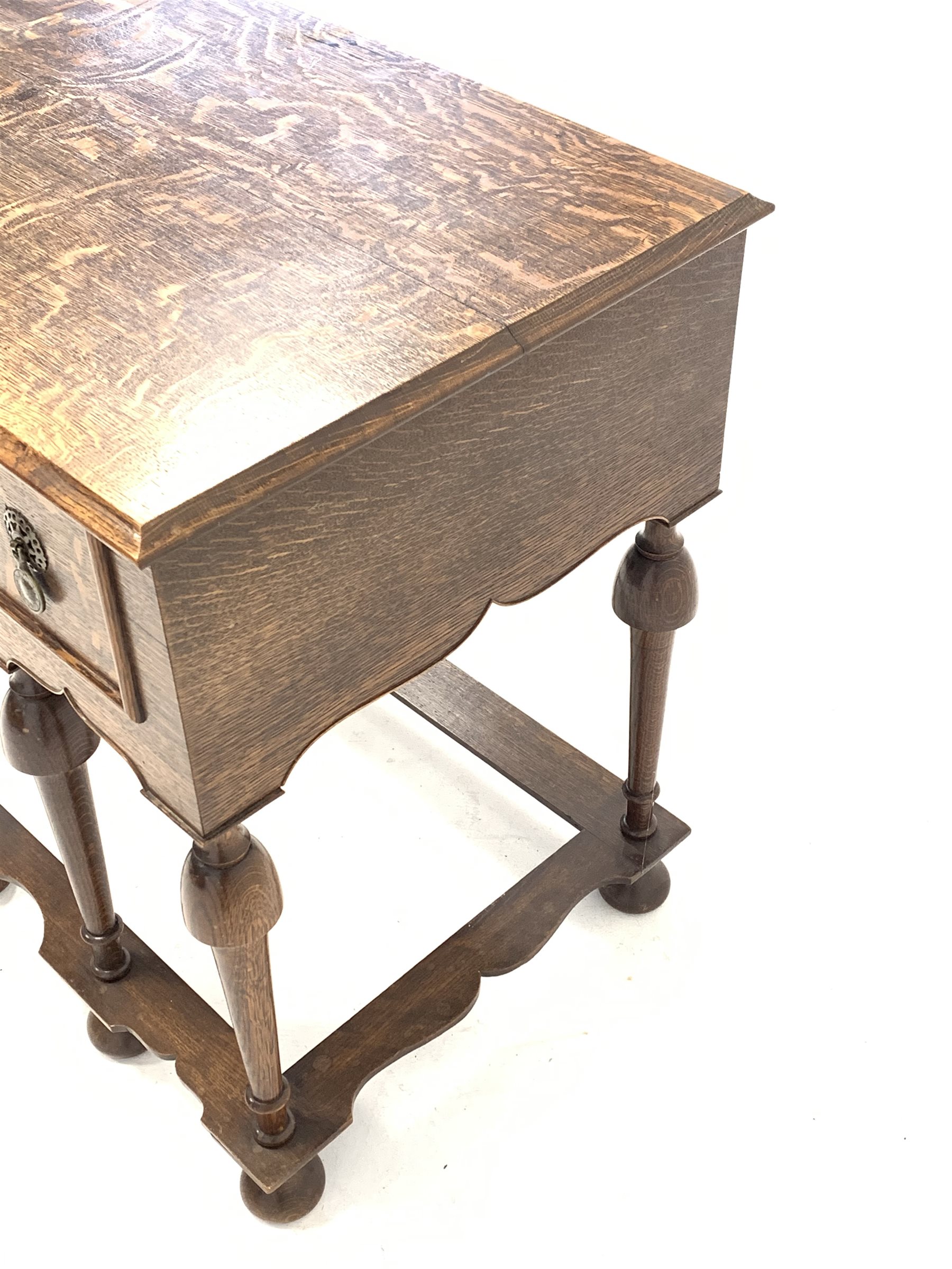 17th century style oak lowboy, fitted with three drawers, raised on turned supports united by shaped - Image 4 of 4